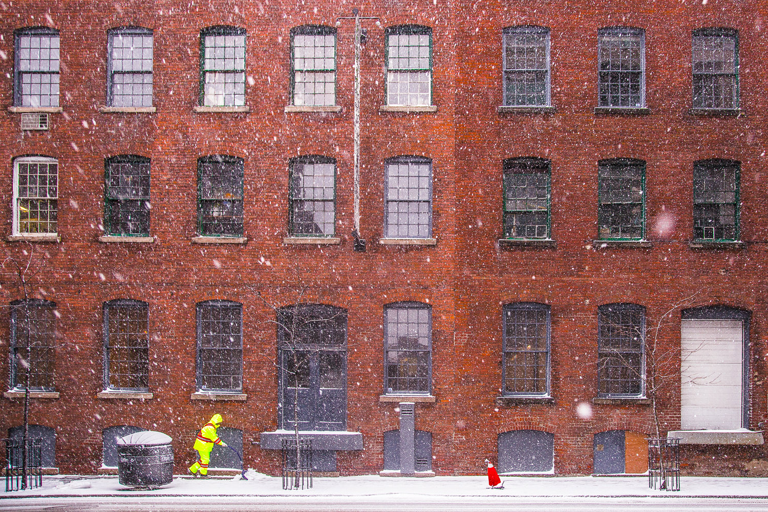 property manager shoveling snow