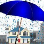 umbrella protecting house from rain